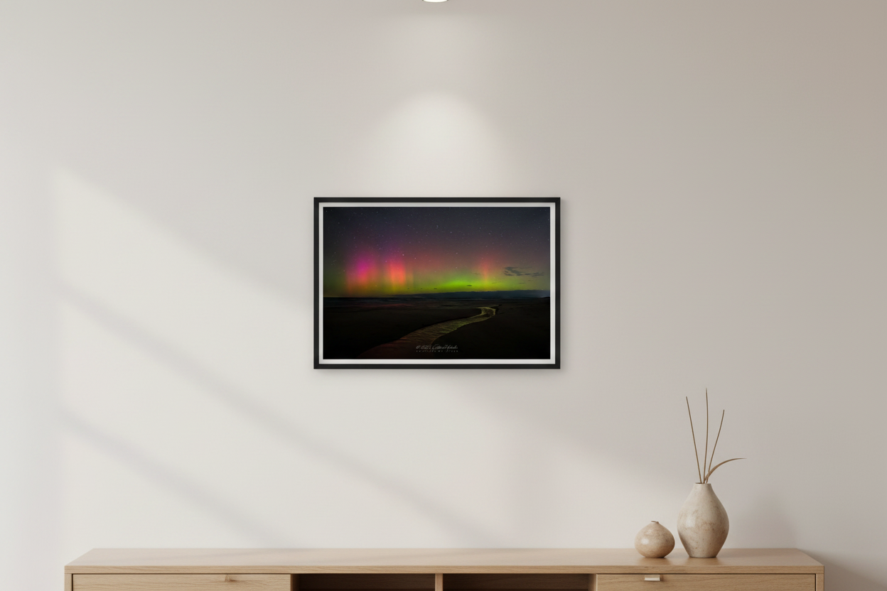 Small fine art landscape print of aurora borealis pillars over a winding creek at Magoon Creek Natural Area Manistee County Michigan displayed in modern living room