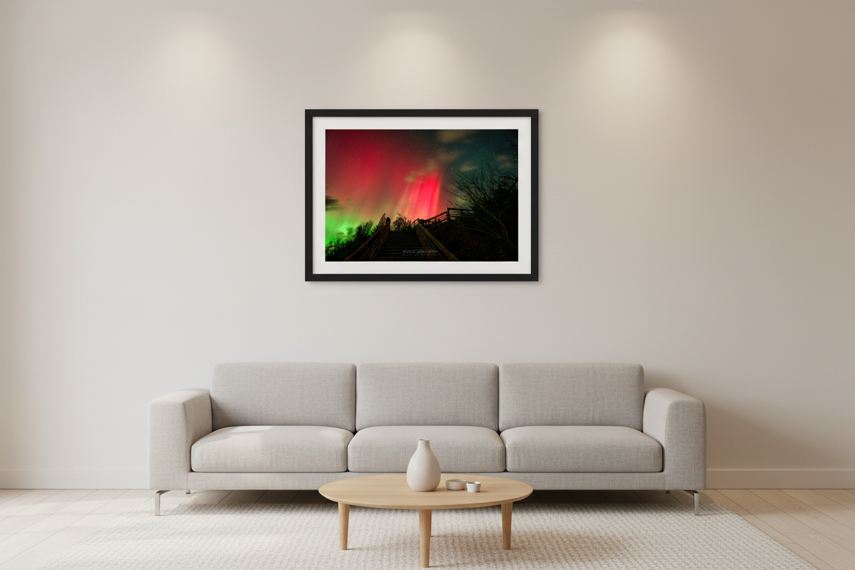 Small fine art landscape print of the northern lights over Inspiration Point Overlook staircase in Arcadia Michigan displayed in modern living room
