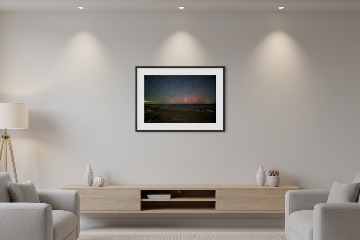 Small fine art print of northern lights aurora borealis over Glen Haven beach displayed in modern living room